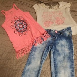 Girls justice outfit, 2 shirts,  1 pair of jeans.